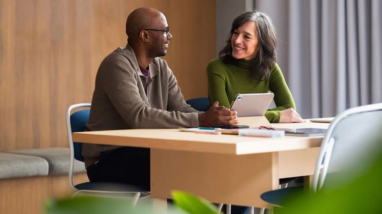 Cybersecurity professionals collaborate on strategies to manage digital risk.