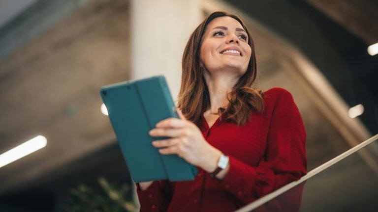 Business professional uses digital technology to support risk and compliance activities.