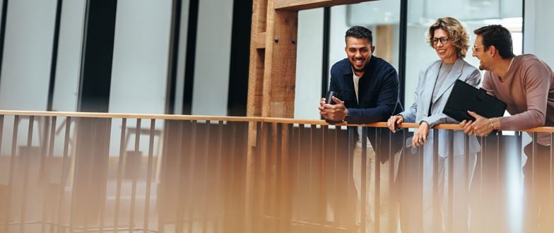 Professionals collaborate to address challenges and deliver quality client service.
