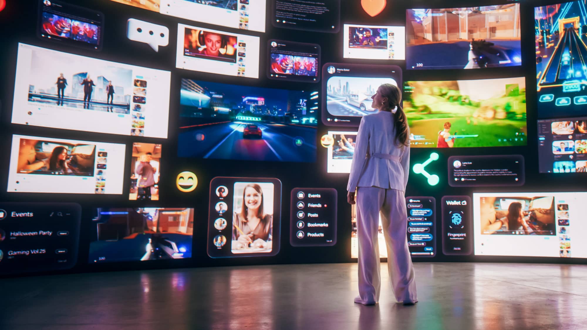 Professional viewing a digital wall of multimedia and social content, symbolizing disruption and complexity in TMT.