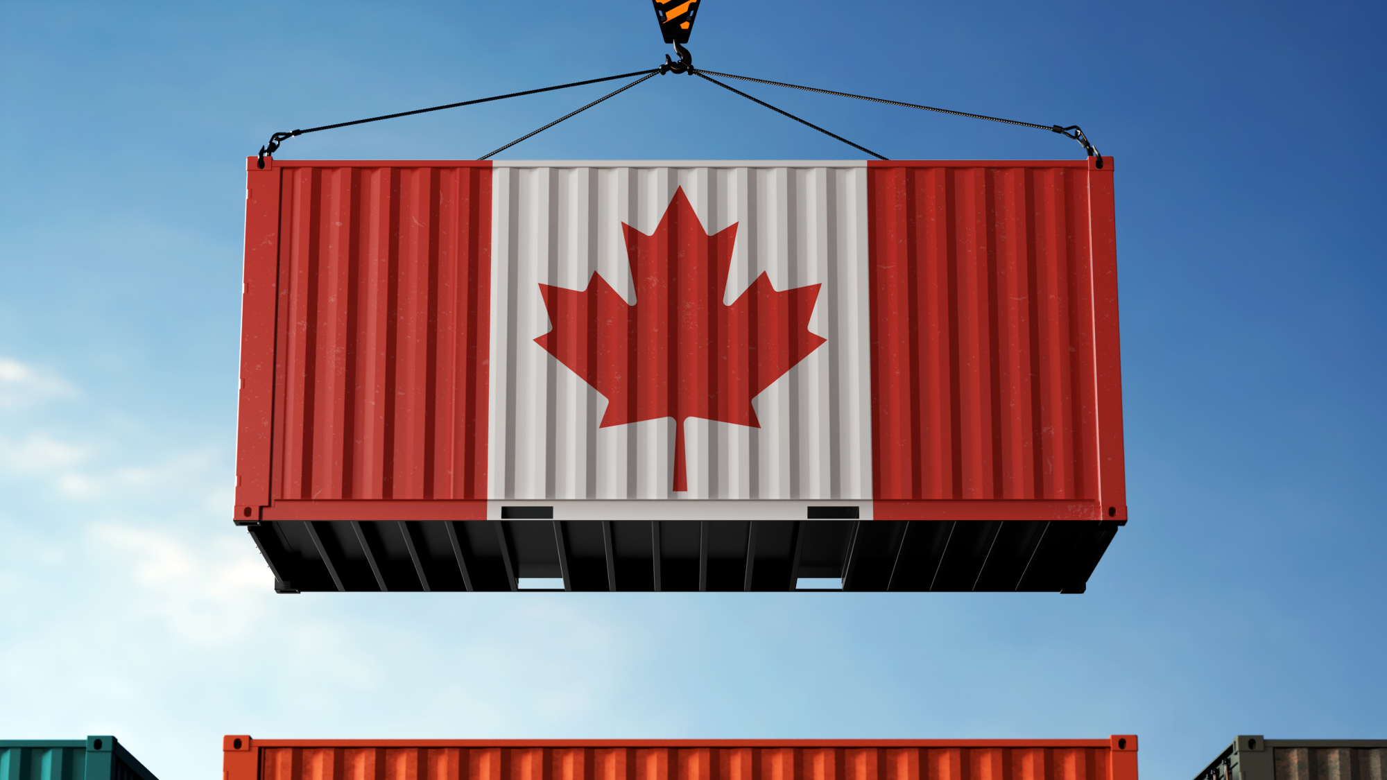 Shipping container painted like the Canadian flag being hoisted by crane, symbolizing cross-border trade.