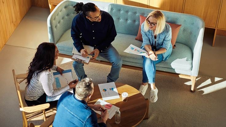 Team meeting to review financial reports and data relevant to upcoming accounting and reporting requirements.