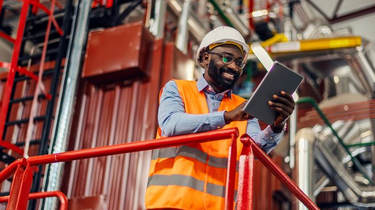 Manfacturing worker explores how to use and implement AI 