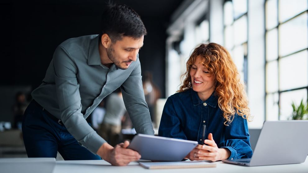 Professionals collaborating on digital tools to modernize lease accounting.