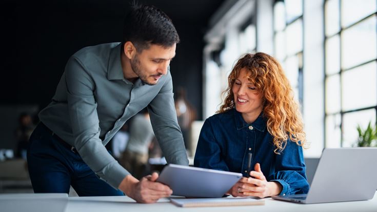 Professionals collaborating on digital tools to modernize lease accounting.