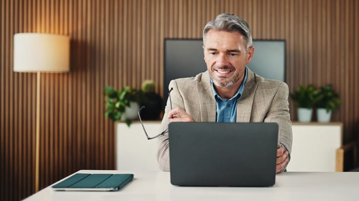 Accounting professional reviews quarterly close trends during a webinar.