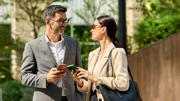 Local agency officials discuss public service ethics requirements outdoors.