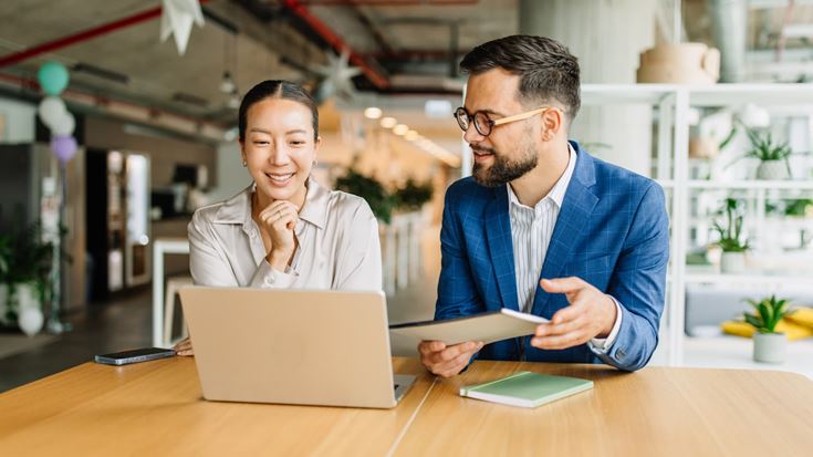 HR and IT professionals collaborate on identity and access management for AI agents