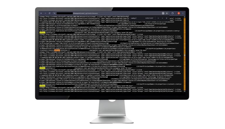 SharePoint REST endpoint showing XML entries for site users, including login names, email fields, titles, and user principal names.