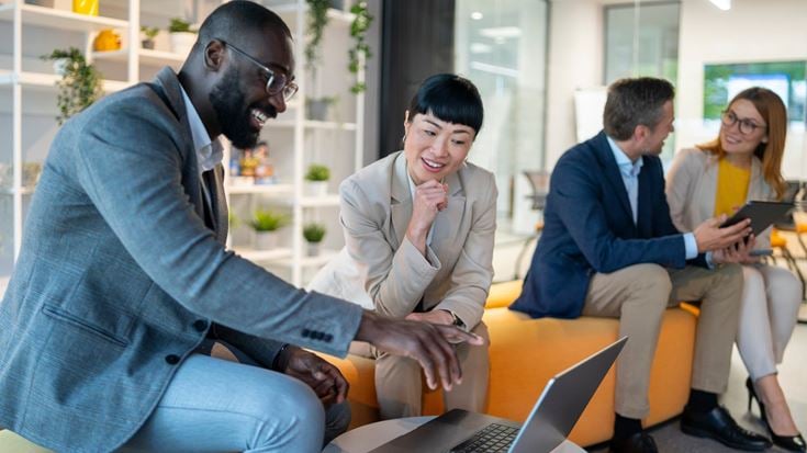 Cybersecurity professionals collaborate to identify and manage AI-related vulnerabilities.