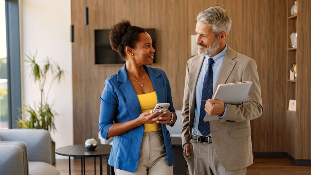 Business professionals discuss regulatory developments and financial industry updates.