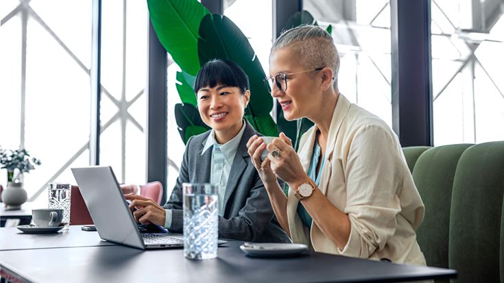 Business professionals review reporting insights to support informed decisions and stronger governance.