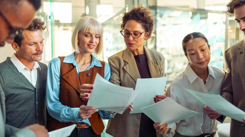 A group of professionals reviewing state and local government financial reporting, compliance posture, operational risk, and governance oversight. 