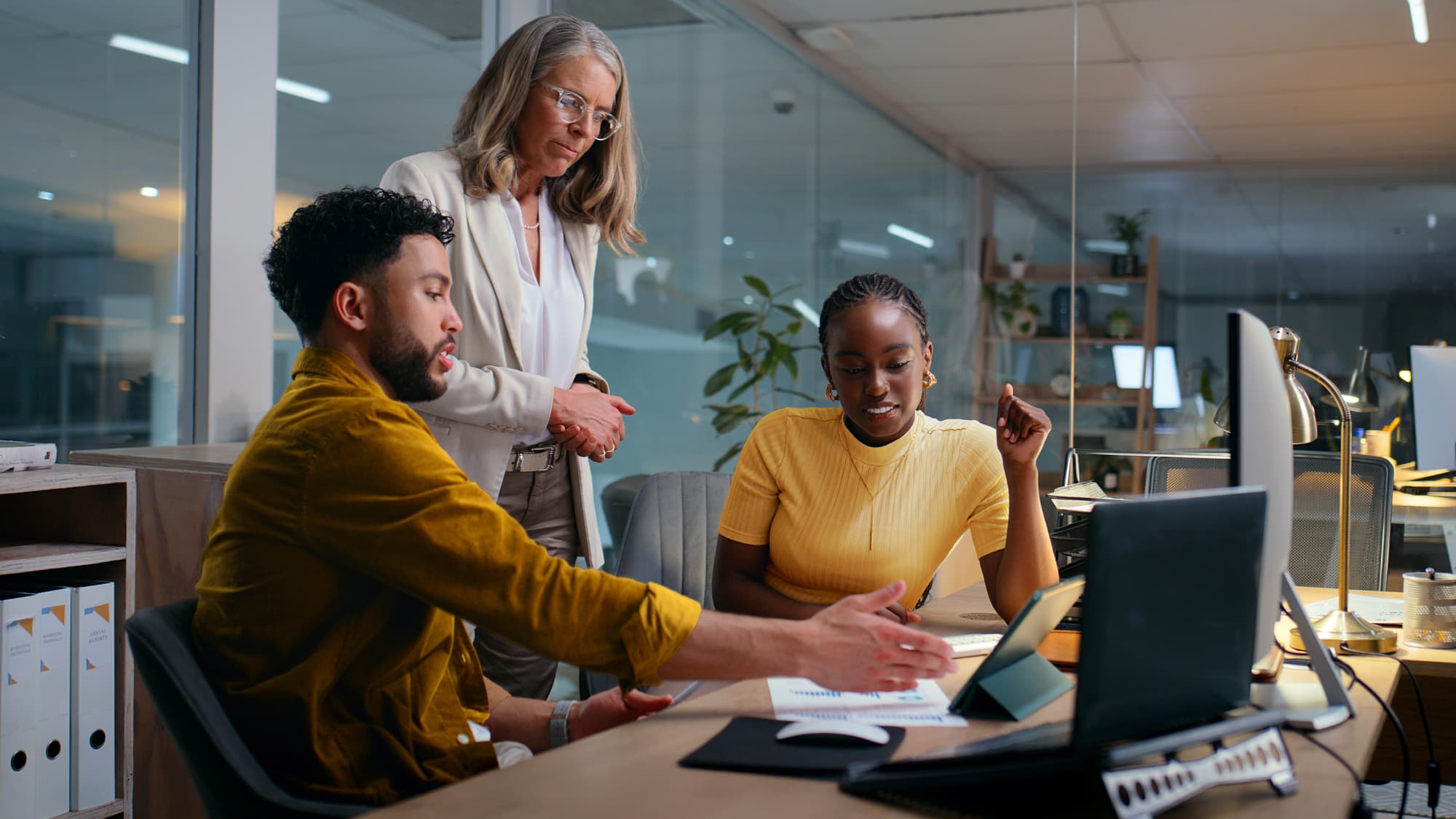 Team reviews financial data in a modern office, representing evaluation and disclosure guidance under GASB Statement 105.