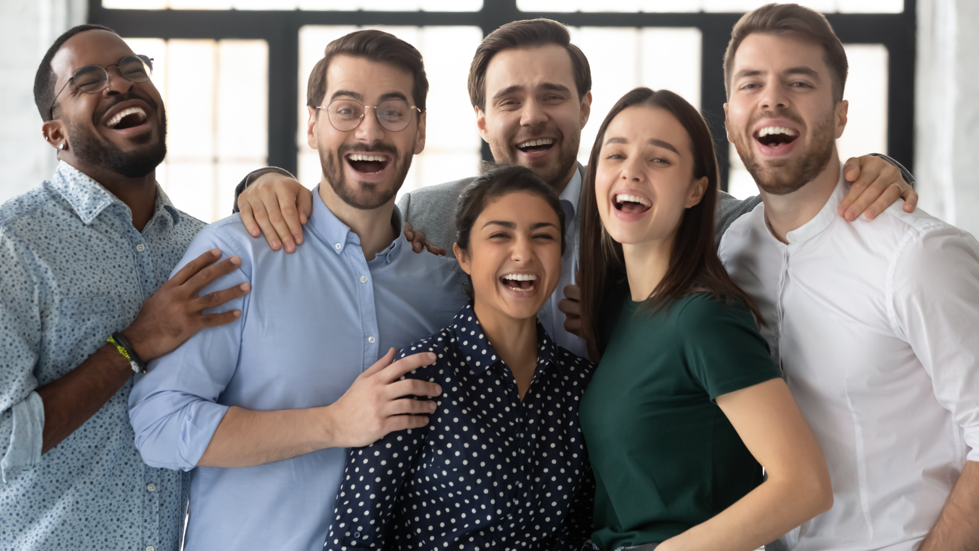 Students smiling in a row