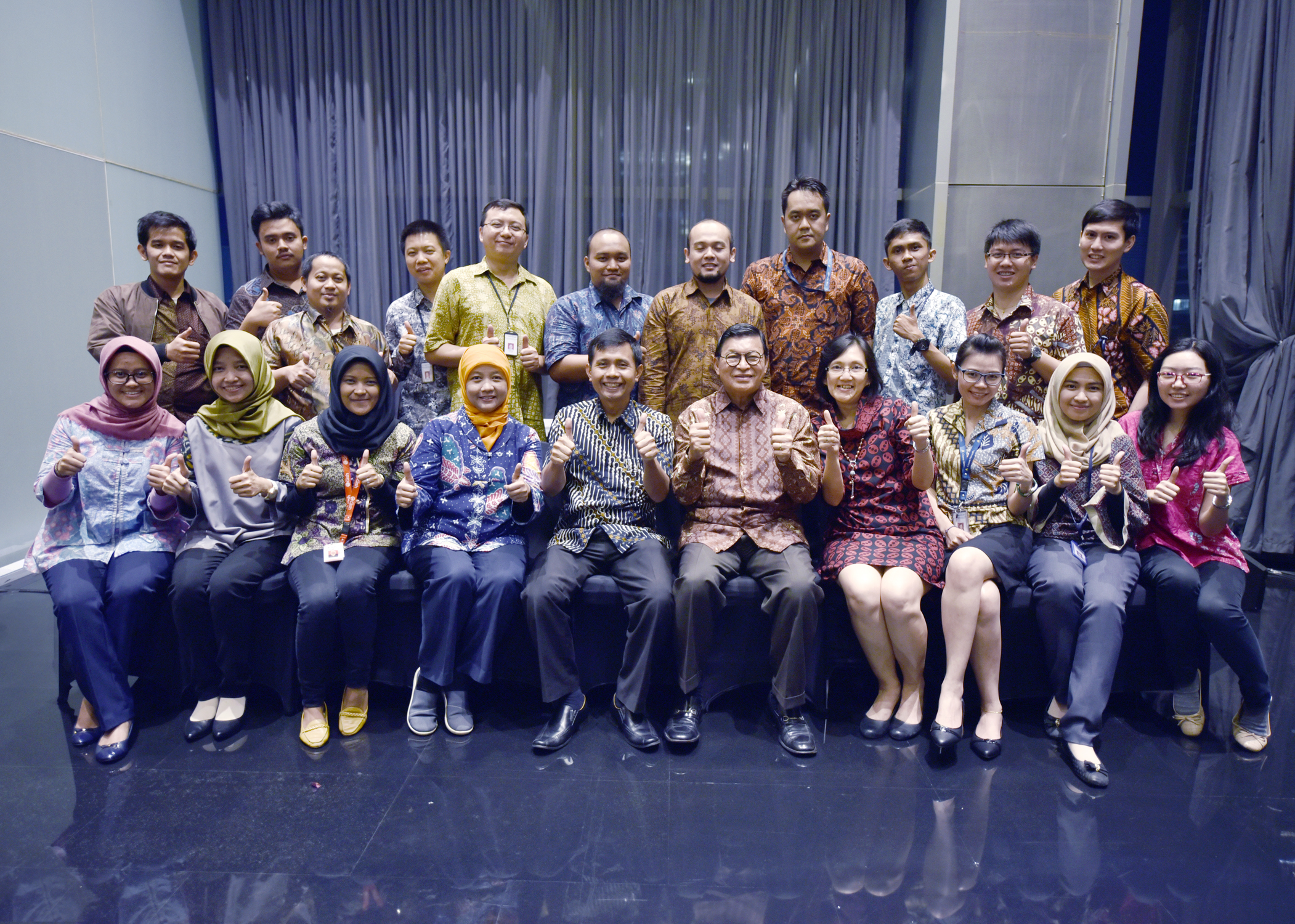 Posing with consulting staffs