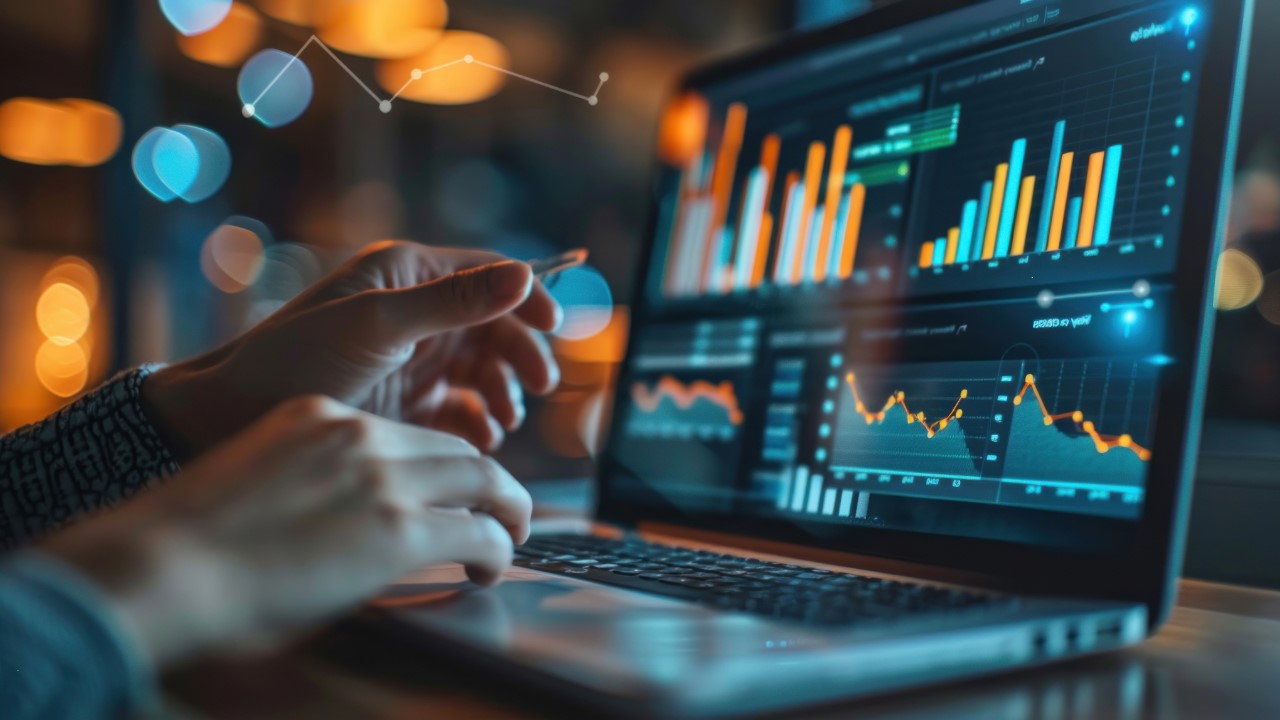 Laptop with graphs on screen