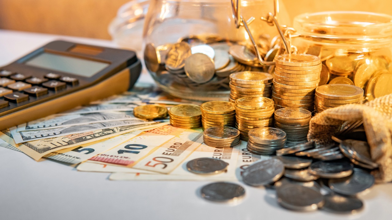 Calculator and cash on desk