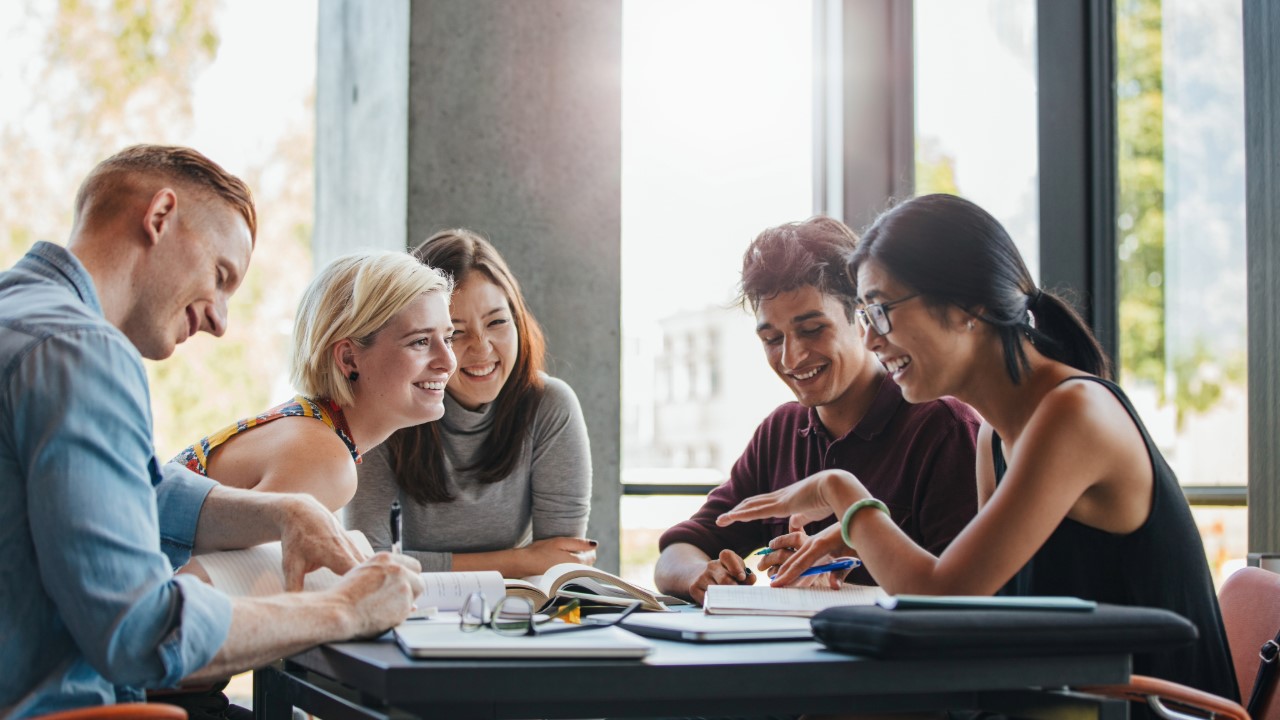 Students sitting around a table