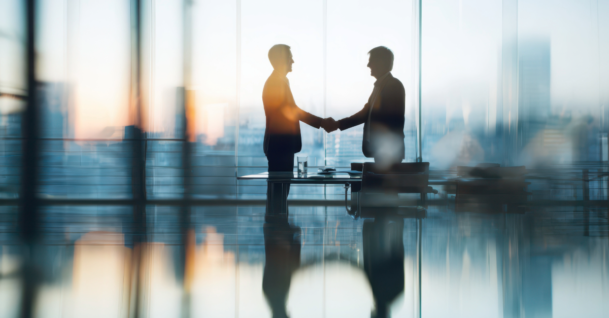 two people shaking hands