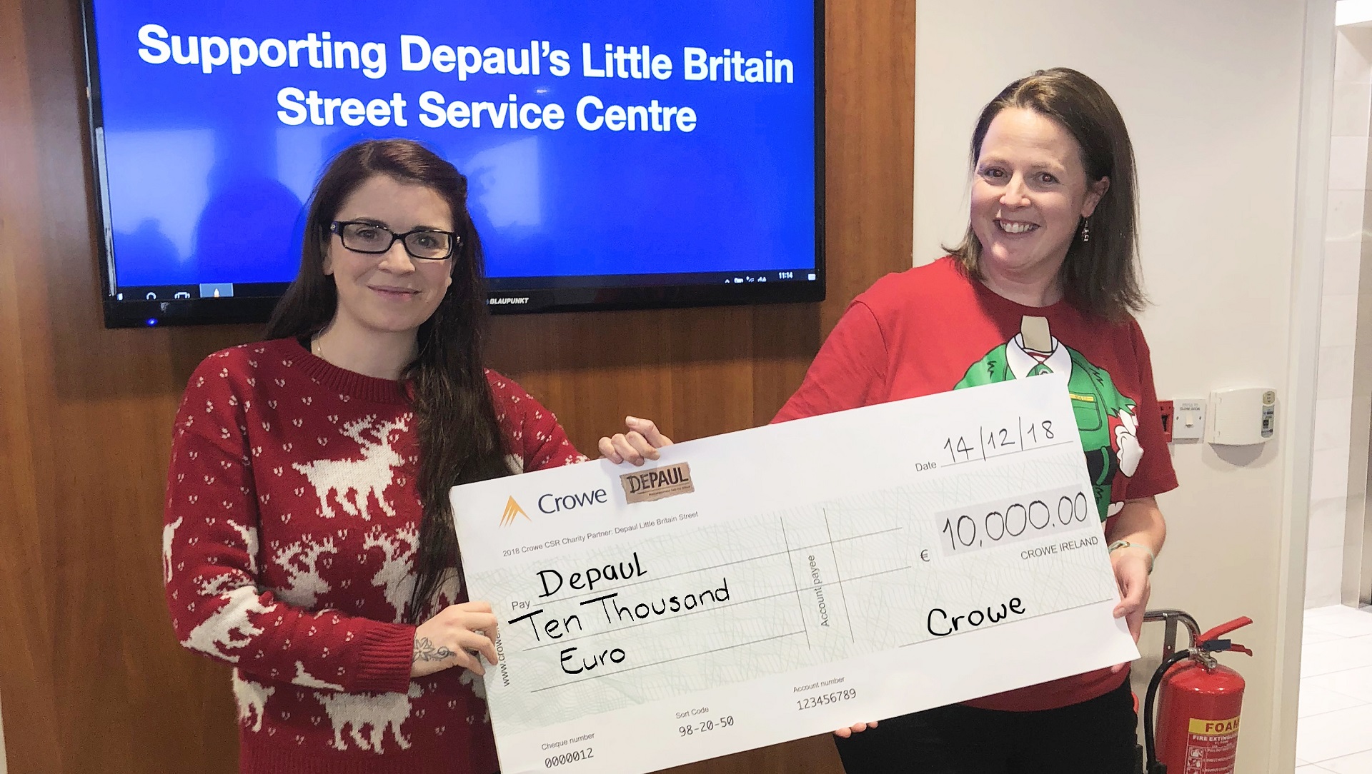 Crowe Ireland staff present fundraising cheque to Depaul