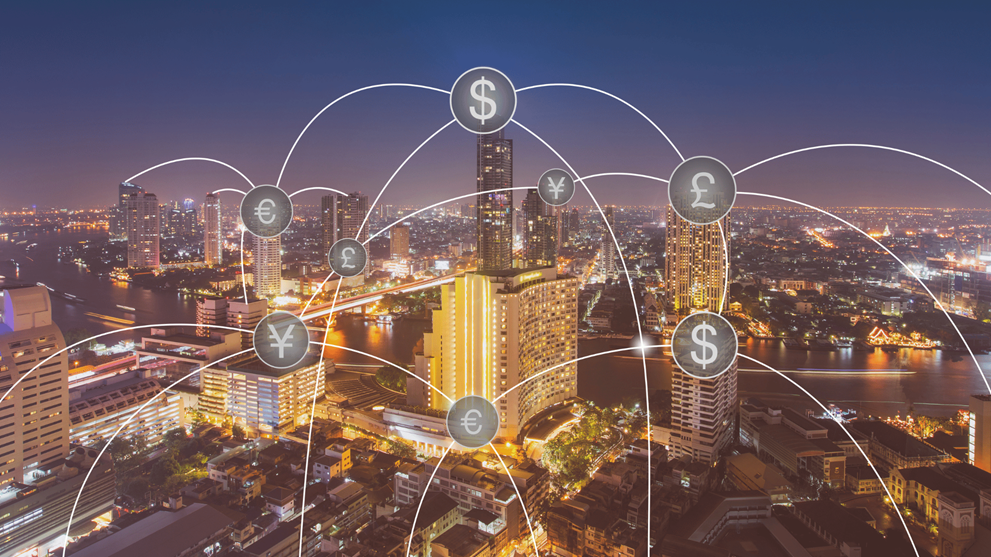 Aerial view of money transfer icon over cityscape for banking concept background