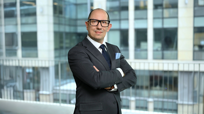 On the photo there is Group Director of Digital Platforms and Transformation