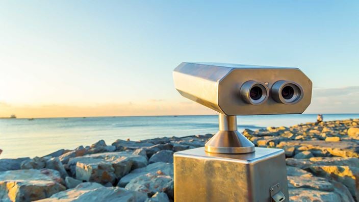 Binocular looking over sea