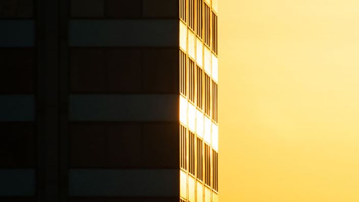 building catching sunset