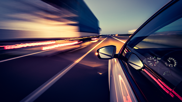 Car on blurry road