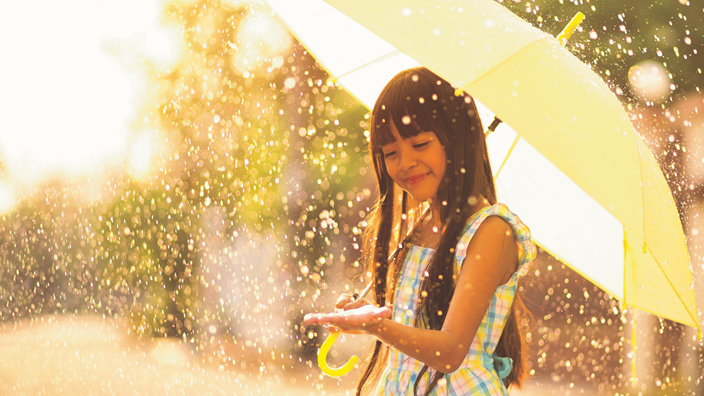 Girl under umbrella
