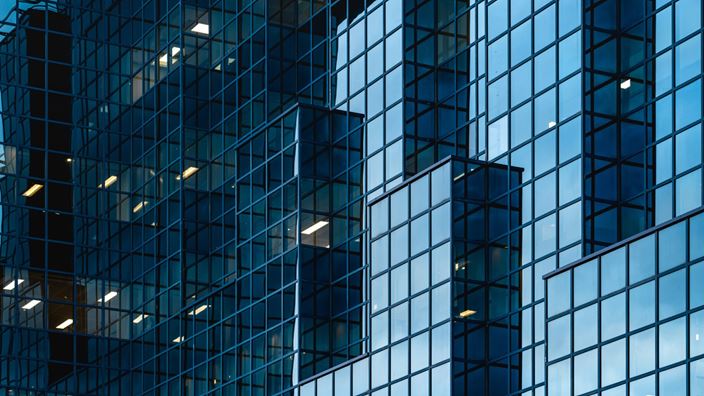 glass building with reflections