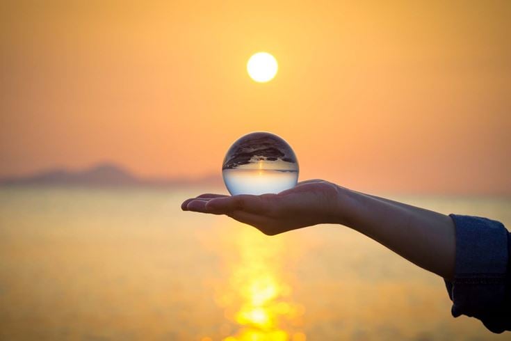 glass orb sphere sunset