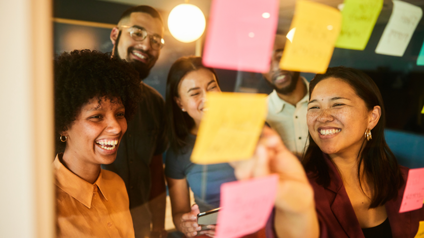 group of people using post-it notes