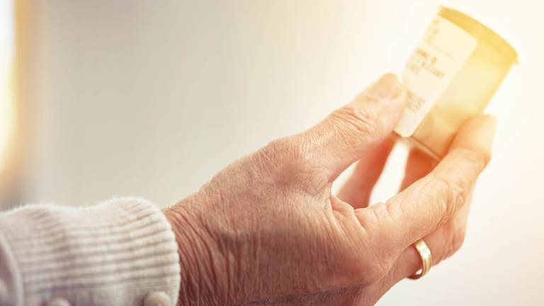 hand holding medication