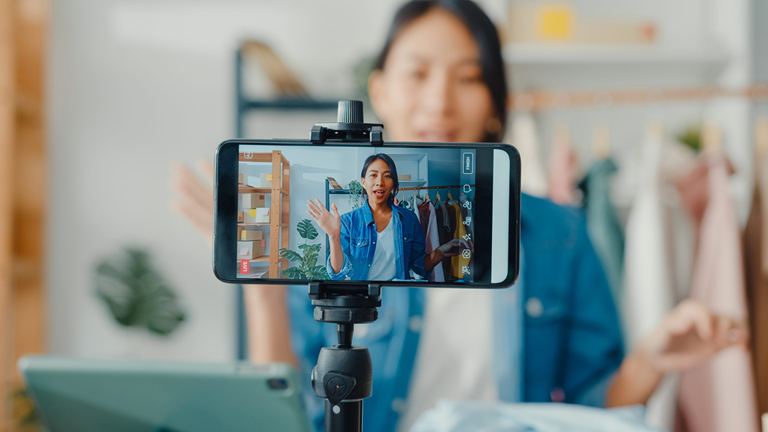 influencer filming on mobile phone
