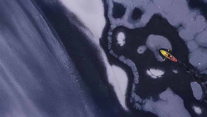 kayak on frozen lake