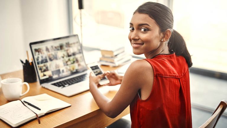 lady-looking-at-phone-with-mobile-list