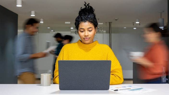 lady with laptop tablet and notepad