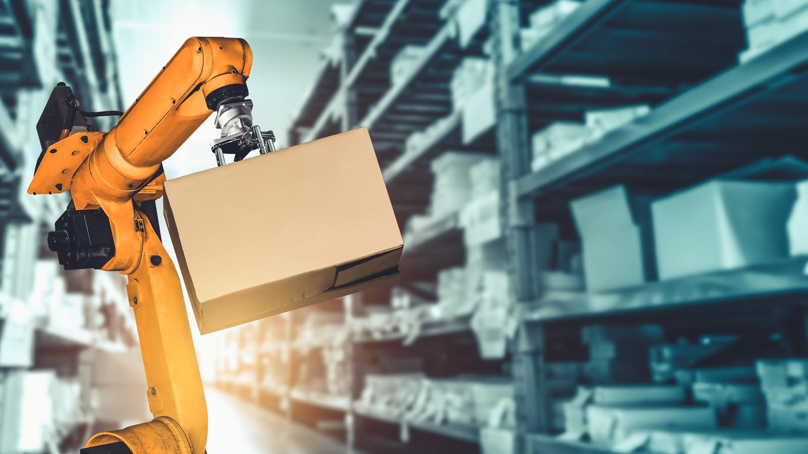 machine lifting cardboard box