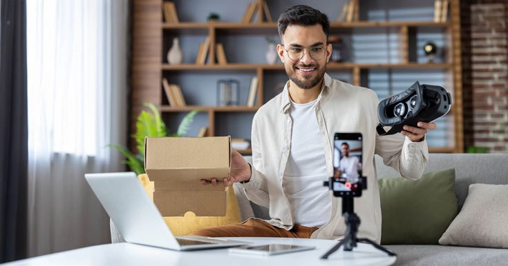 man setting up SM filming