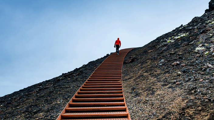 Man walking up steps
