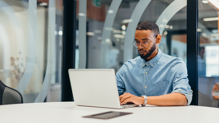 man working on laptop