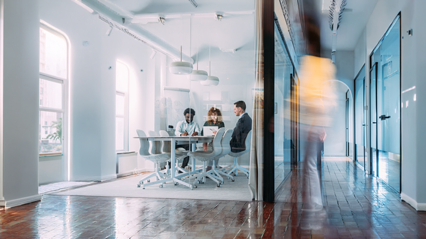 people in an office having a meeting