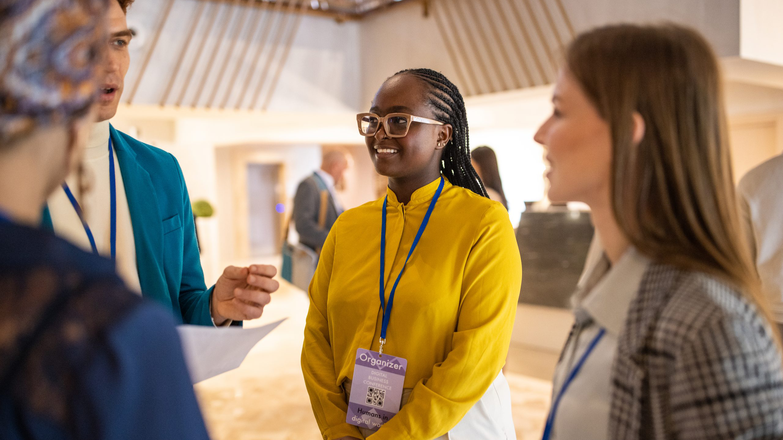people talking at a conference event