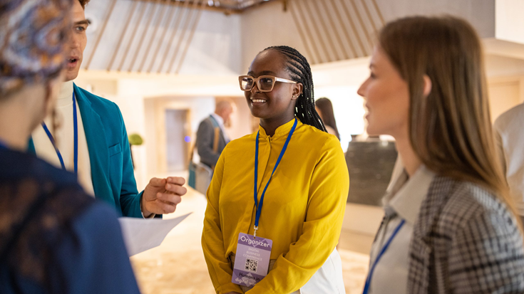 people talking at a conference event