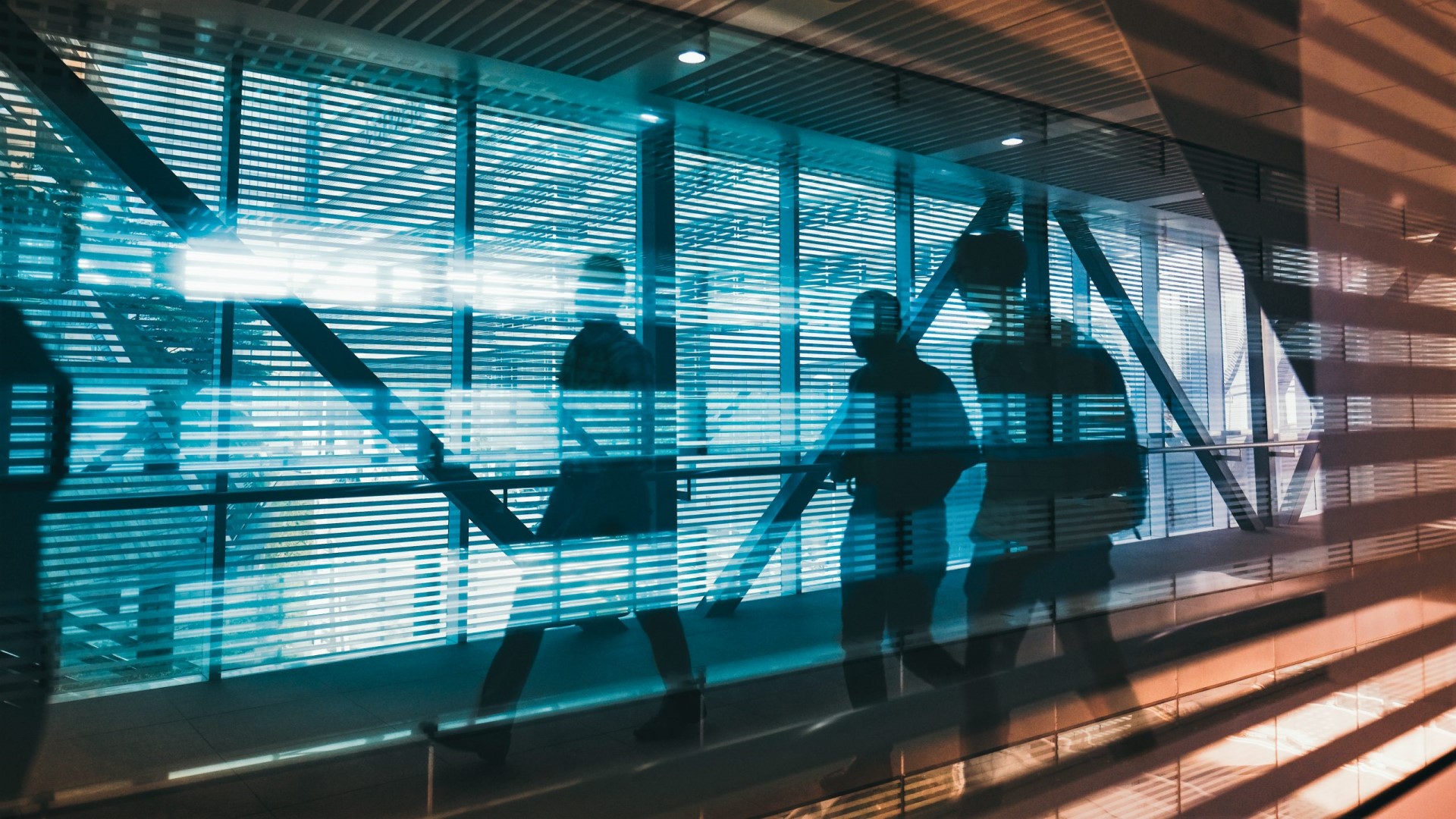 people walking window reflection