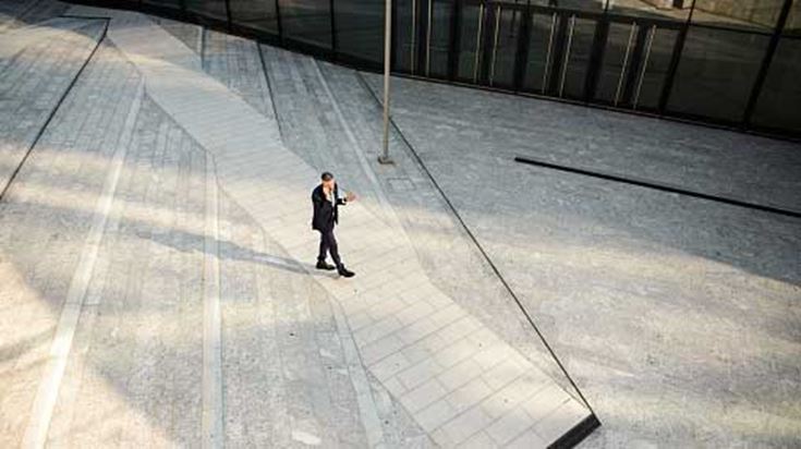 Professional man walking down the steps