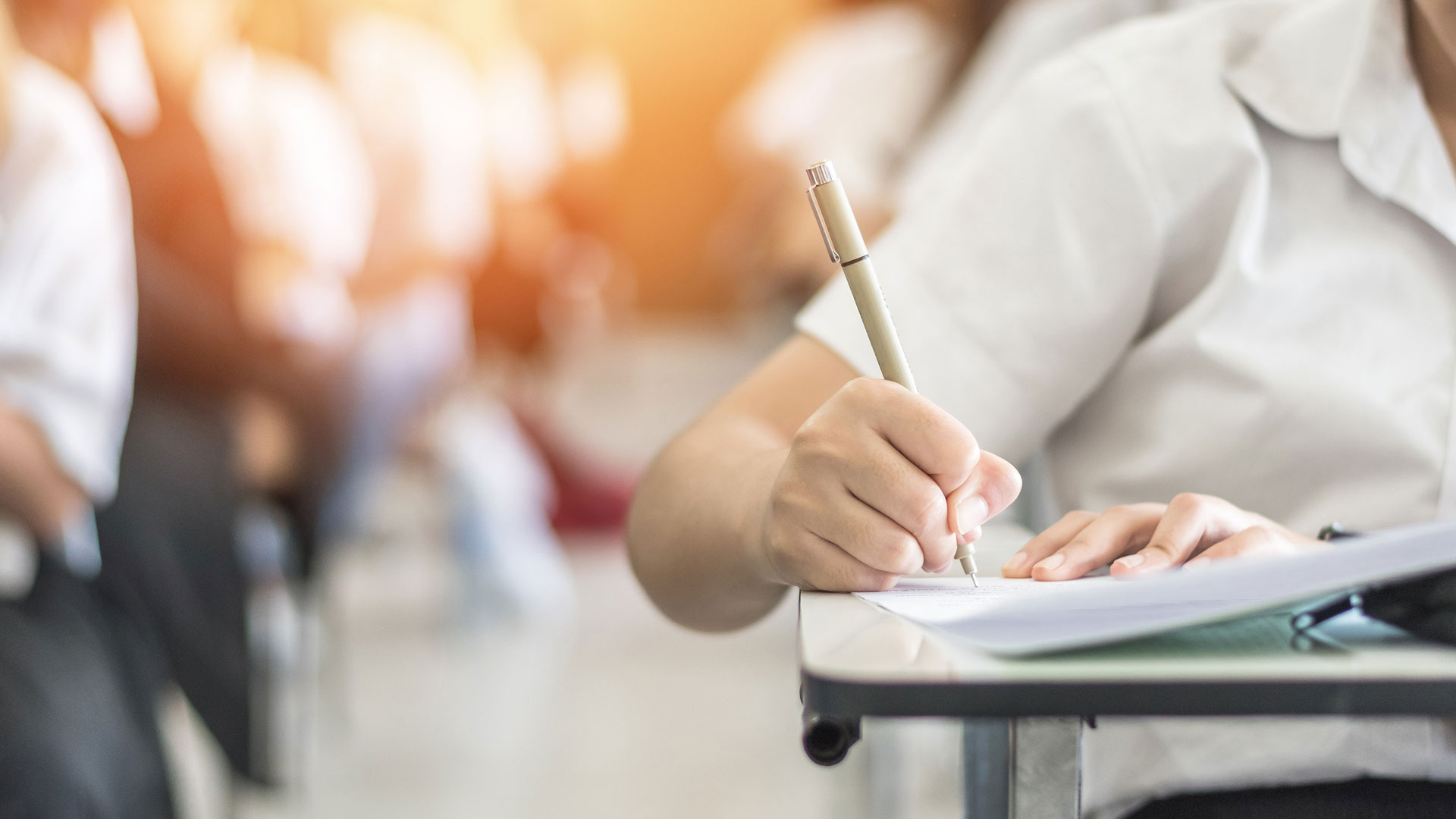 Pupil-at-desk-in-classroom
