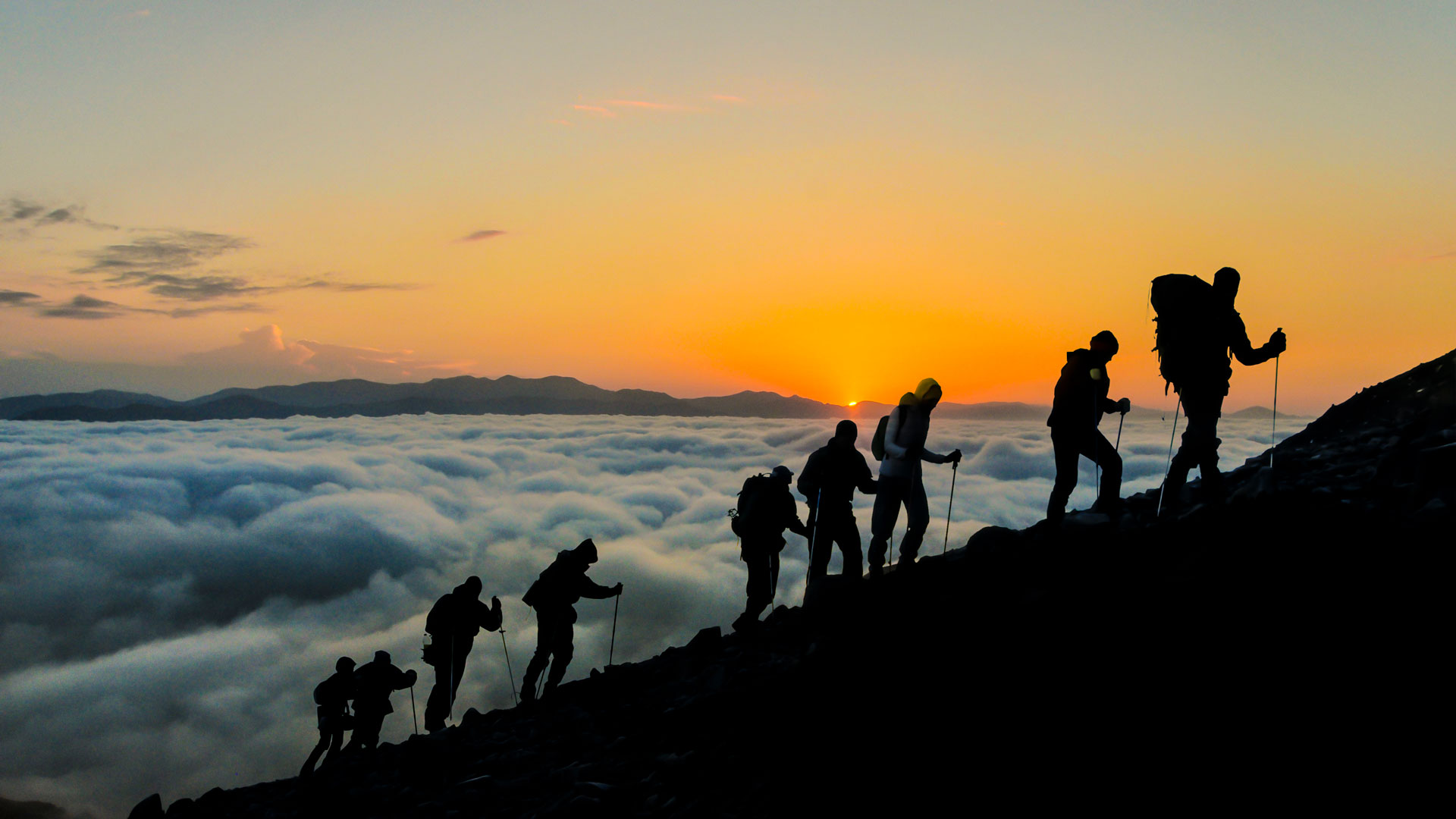 Silhouettes-of-hikers-at-sunset